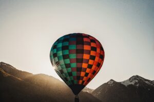 hot air balloon in mountains